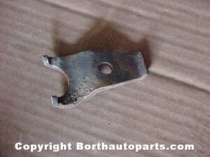 A 1964 Buick distributor hold down plate