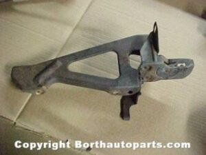 A 1964 Buick hood latch grill support