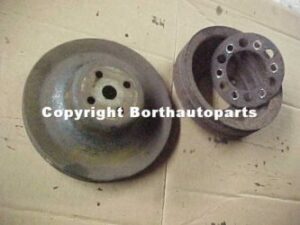 A 1966 Buick engine water crank shaft pulleys