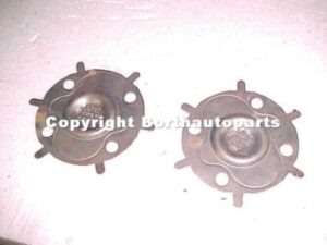 A 1950 Dodge Chrysler drive shaft cover plates