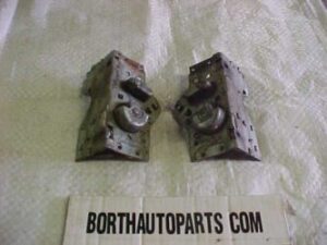 A 1950 Dodge Coronet front door latch assembly