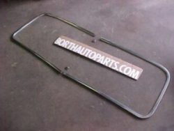 A 1950 Dodge Coronet windshield with stainless trims